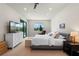 Spacious main bedroom with ample natural light, neutral carpet, and a ceiling fan at 327 Island Sound Ct, Longwood, FL 32779