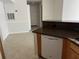 Kitchen featuring granite countertops and stainless steel dishwasher at 3344 Corona Village Way # 205, Orlando, FL 32835