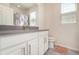 Bathroom with a white vanity, grey countertop, and a shower featuring a colorful shower curtain at 3443 Sagebrush St, Harmony, FL 34773