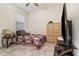 Cozy bedroom featuring a quilt, TV, and a ceiling fan for added comfort at 3443 Sagebrush St, Harmony, FL 34773