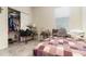 Cozy bedroom featuring a quilt, closet, and a window for natural light at 3443 Sagebrush St, Harmony, FL 34773