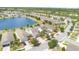 Street view highlighting attractive homes with lush landscaping along a serene street, capturing a sense of community and curb appeal at 3443 Sagebrush St, Harmony, FL 34773