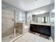 Primary bath showcasing a dual sink vanity, walk-in shower and soaking tub combo at 3450 Puxton Dr, Orlando, FL 32824