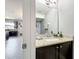 Half bathroom features granite counters, modern fixtures and tile floors at 3450 Puxton Dr, Orlando, FL 32824
