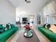 Bright living room showcasing custom seating, decorative accents, and elegant sheer curtains at 3450 Puxton Dr, Orlando, FL 32824