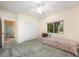 Simple bedroom with a twin bed, closet, and window at 3831 River Hollow Ct, Oviedo, FL 32765