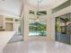 Bright dining area with tile flooring and pool view at 3831 River Hollow Ct, Oviedo, FL 32765