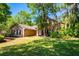 Beautiful single Gathering home with brick accents and lush landscaping at 3831 River Hollow Ct, Oviedo, FL 32765