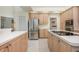 Functional kitchen with stainless steel appliances, an island cooktop, and plenty of counter space at 3831 River Hollow Ct, Oviedo, FL 32765