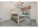 Carpeted bedroom with a four-poster bed and a view of the pool at 3831 River Hollow Ct, Oviedo, FL 32765