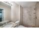Renovated bathroom with new tile shower, granite countertop and modern fixtures at 3960 Southpointe Dr # 501, Orlando, FL 32822