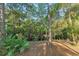 Lush and private wooded property with mature trees and creek at 4000 Rouse Rd, Orlando, FL 32817