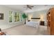 Serene bedroom retreat with large windows overlooking the surrounding nature at 4000 Rouse Rd, Orlando, FL 32817
