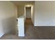 Upstairs hallway with neutral paint and carpet throughout at 4058 Brookshire Cir, Eustis, FL 32736