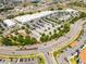Aerial view of the shopping center and roads, highlighting the development's location and accessibility at 43420 Highway 27 # 121, Davenport, FL 33837