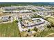 Extensive aerial view showing the apartment complex in relation to surrounding commercial areas at 43420 Highway 27 # 121, Davenport, FL 33837
