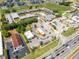 Aerial view of the complex and nearby restaurants, shopping centers and roadways at 43420 Highway 27 # 121, Davenport, FL 33837
