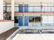Close-up of a classic motel exterior with rows of blue doors and windows at 43420 Highway 27 # 121, Davenport, FL 33837