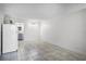 A bright, tiled living space connects seamlessly to the kitchen and bathroom, creating a functional and open layout at 43420 Highway 27 # 121, Davenport, FL 33837