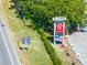 Community signage on display, highlighting nearby retailers and highway access at 43420 Highway 27 # 121, Davenport, FL 33837