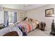 Bright bedroom featuring a comfortable bed, natural light, and ample space for relaxation at 440 Orienta Point St, Altamonte Springs, FL 32701