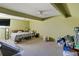 Spacious bedroom with a ceiling fan, neutral carpet, ready to be personalized for relaxation and rest at 440 Orienta Point St, Altamonte Springs, FL 32701