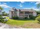 Inviting townhome with a well-maintained lawn, offering a blend of comfort and convenience at 440 Orienta Point St, Altamonte Springs, FL 32701