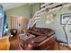 Spacious living room with vaulted ceiling, modern decor, and staircase at 440 Orienta Point St, Altamonte Springs, FL 32701