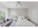 Bedroom with natural light features a sofa and cozy interior at 478 Water St, Kissimmee, FL 34747