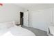This bedroom features a closet and an adjacent doorway leading to the upper floor at 478 Water St, Kissimmee, FL 34747