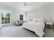 Bright bedroom with lots of natural light and a cozy sitting area at 478 Water St, Kissimmee, FL 34747