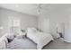 Bright bedroom with lots of natural light, a sofa, and a full-length mirror at 478 Water St, Kissimmee, FL 34747