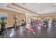Well-equipped fitness center with treadmills, ellipticals, and weight machines at 5838 Cypress Hill Rd, Winter Garden, FL 34787