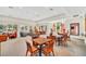 Spacious resident clubhouse area provides tables, chairs, and comfortable lounge areas at 5838 Cypress Hill Rd, Winter Garden, FL 34787