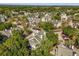 Lovely aerial view of the neighborhood featuring lush greenery and attractive condominium residences at 6178 Westgate Dr # 101, Orlando, FL 32835