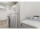 The home features convenient in-unit laundry with a washer and dryer at 6178 Westgate Dr # 101, Orlando, FL 32835