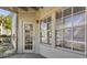 Relax on your private screened porch with views of the surrounding landscaping at 6178 Westgate Dr # 101, Orlando, FL 32835