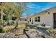 Backyard with a wooden deck and a dining table for enjoying meals outdoors at 623 Green Meadow Ave, Maitland, FL 32751