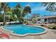 Sparkling pool with mature landscaping and plenty of space for outdoor relaxation and entertainment at 623 Green Meadow Ave, Maitland, FL 32751