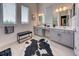 Modern bathroom with double vanities, ample counter space, and natural light at 6301 Sand Skipper Rd, Orlando, FL 32821