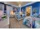 Charming bedroom with playful cartoon theme, mural walls and cozy beds at 6301 Sand Skipper Rd, Orlando, FL 32821