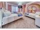 This bedroom showcases a princess theme, including mural walls, white furniture, and chandelier lighting at 6301 Sand Skipper Rd, Orlando, FL 32821