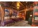 This bedroom is Harry Potter themed, featuring multiple beds, window views of Hogwarts, and character wall decor at 6301 Sand Skipper Rd, Orlando, FL 32821