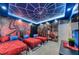 Unique bedroom featuring creative Spiderman themed decor with custom lighting at 6301 Sand Skipper Rd, Orlando, FL 32821