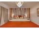 Bright and airy bedroom with decorative pillows, bedside tables, and soft, neutral tones at 6301 Sand Skipper Rd, Orlando, FL 32821