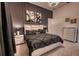 Elegantly styled bedroom featuring a plush bed, dark accents, and sophisticated decor at 6301 Sand Skipper Rd, Orlando, FL 32821