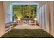 Bright bedroom with king bed featuring a mural and decorative pillows, complemented by stylish lighting at 6301 Sand Skipper Rd, Orlando, FL 32821