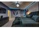 This bedroom features a Maleficent theme, including a wall mural and themed decor, plus a modern chandelier at 6301 Sand Skipper Rd, Orlando, FL 32821