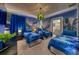 The themed bedroom features three twin beds, custom murals, and unique lighting fixtures at 6301 Sand Skipper Rd, Orlando, FL 32821