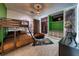 This bunk bedroom is full of dino themed art and furniture at 6301 Sand Skipper Rd, Orlando, FL 32821